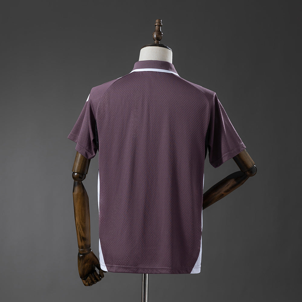 Manchester United 2025/26 Polo Gris Púrpura